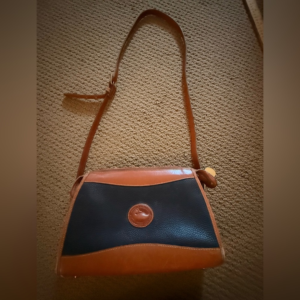 Vintage 80’s 90’s Dooney & Bourke
Leather Black and Brown Bag with Embossed Logo